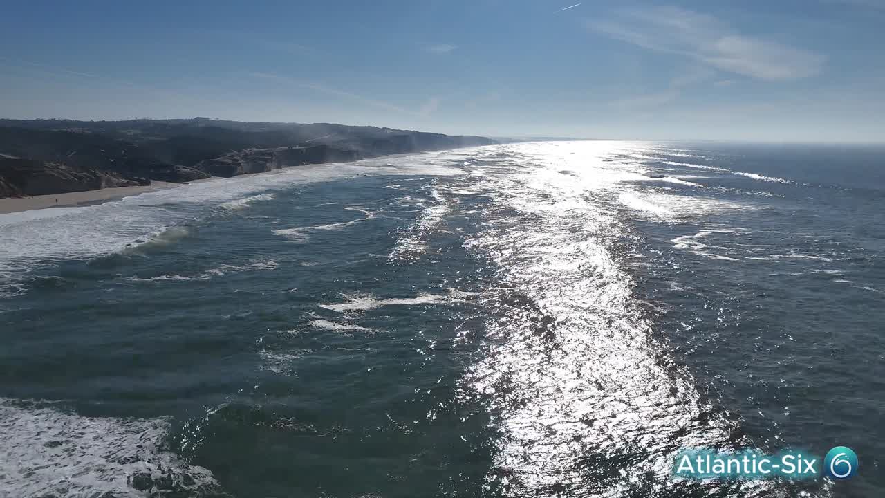 Wide footage of the beach and swell at Rei Cortiço.